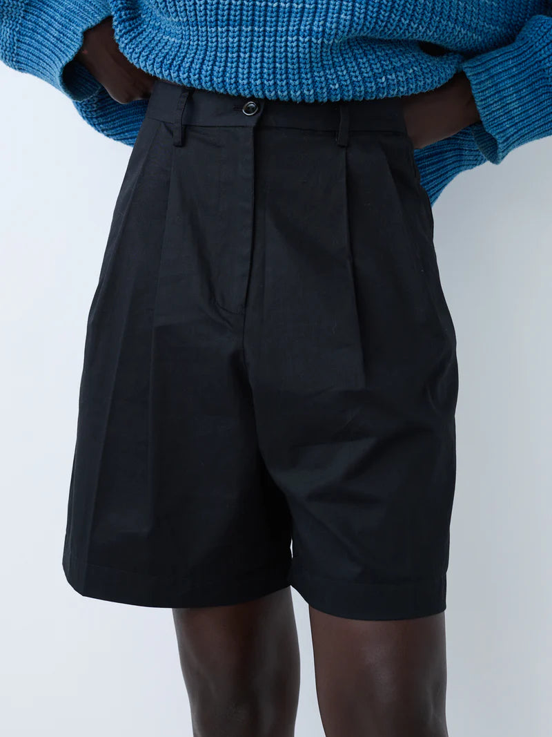 Boy Short in Onyx by Shaina Mote, relaxed-fit Bermuda style with front pleats, above-the-knee length, and tailored silhouette.