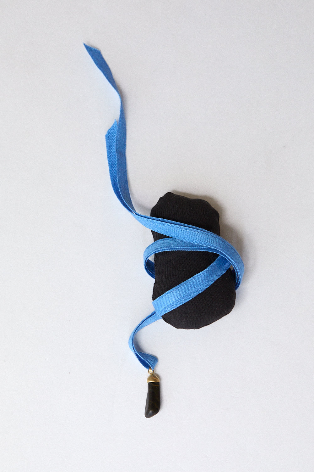 Black stone pendant- 18 carat gold cap