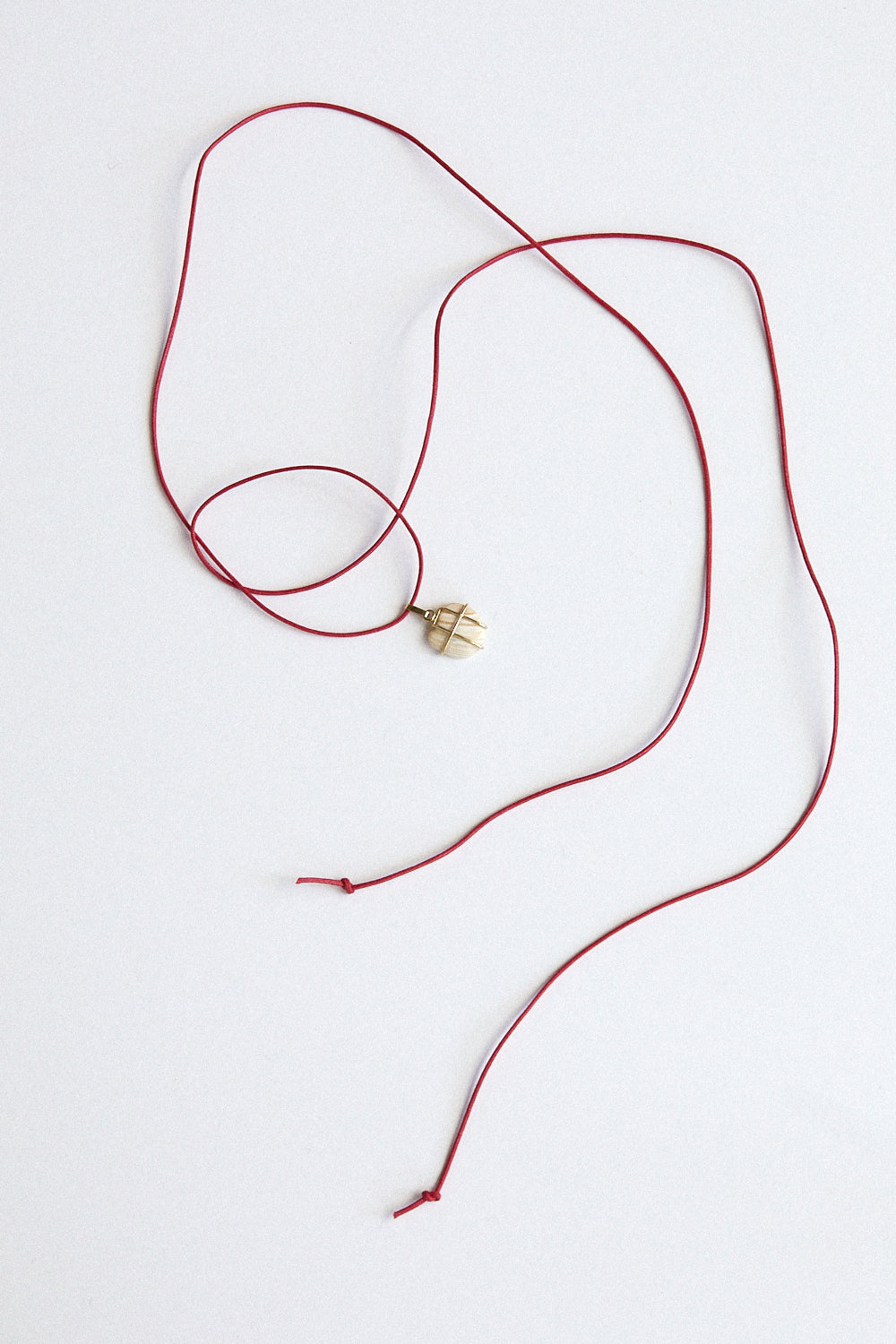 Ivory Shell Pendant - 18 carat gold cage setting