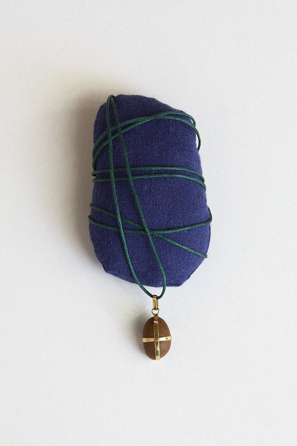 Caramel stone pendant-18 carat gold ribbon
