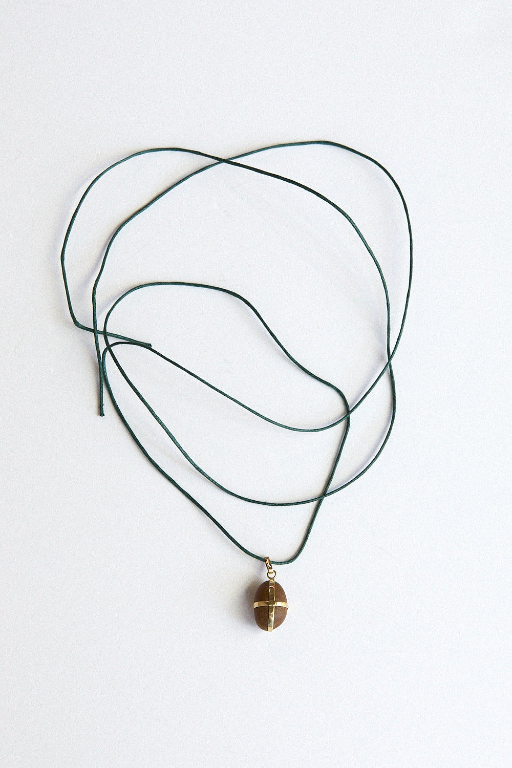 Caramel stone pendant-18 carat gold ribbon