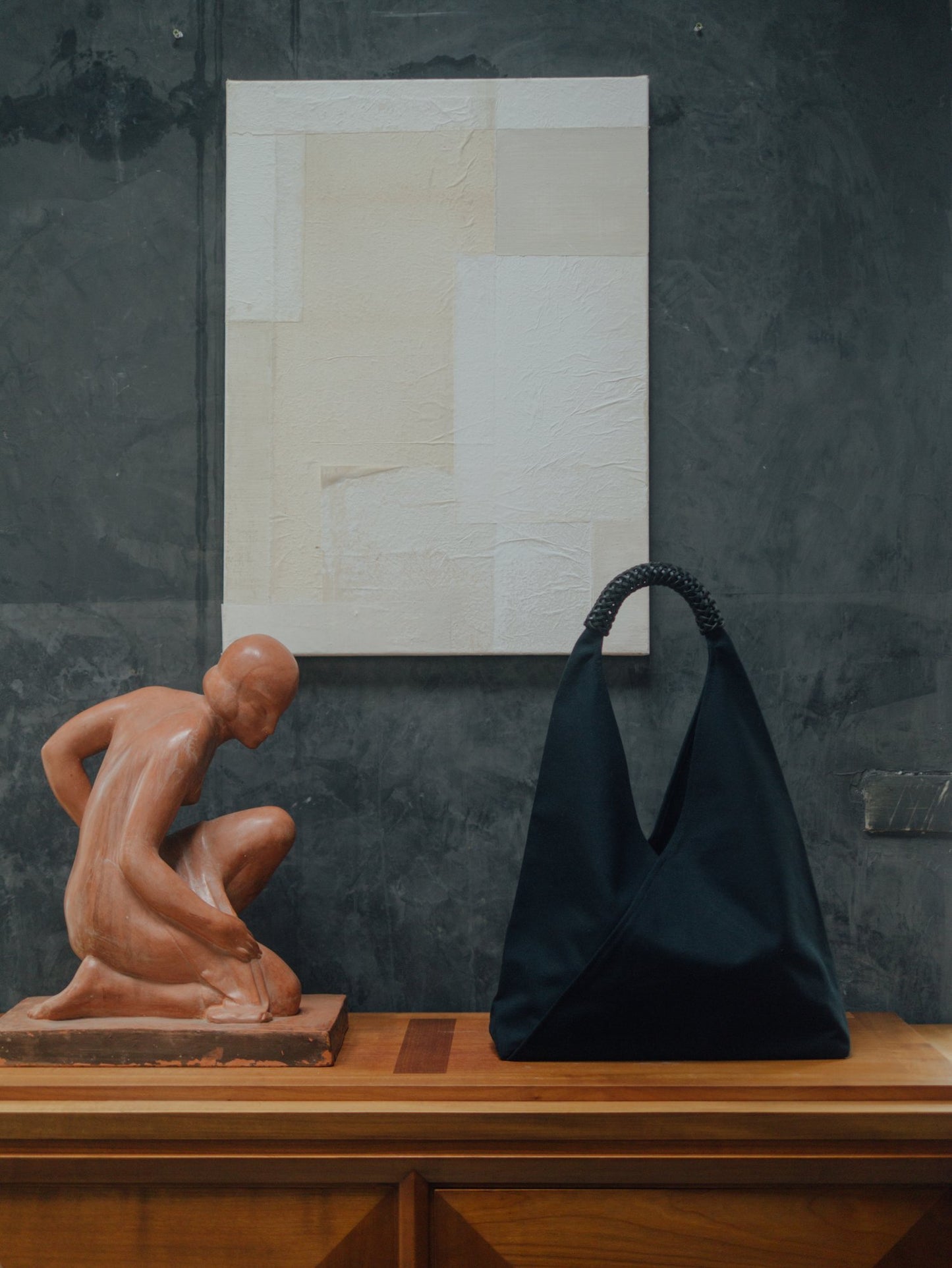 Triangle Bag 58 by Kamaro’an in Black.