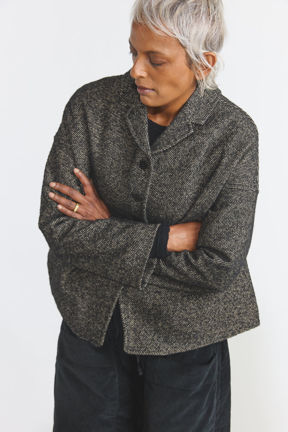 front view of model wearing a Album Di Famiglia Loose Blazer in Black styled with black pants