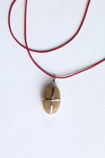 Amber Stone - 9 carat gold ribbon setting