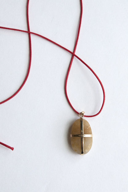 Amber Stone - 9 carat gold ribbon setting